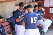 Tebow in special pre-game "handshake" with a teammate.